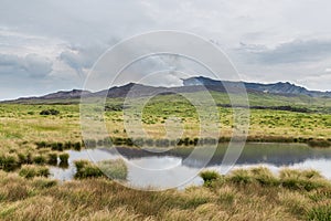 Powerful erupting Mount Aso with little pond in Kumamoto, Japan