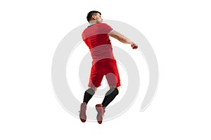 Powerful, flying above the field. Young football, soccer player in action, motion isolated on white background .