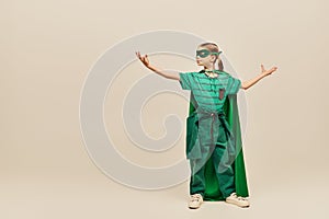 powerful girl in superhero costume with