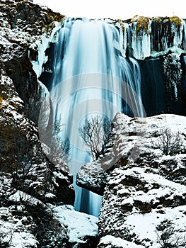 Powerful Icelandic waterfall in winter