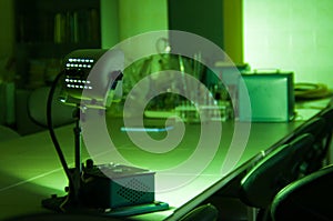 Powerful industrial green laser equipment in a laboratory