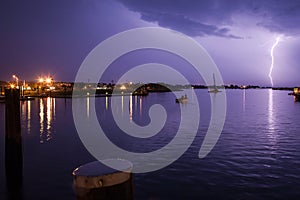 Powerful Lightning Strike Over Harbor