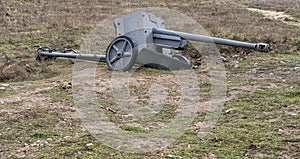 Powerful Military machine gun. Medieval cannon or machinegun on platform in battle field