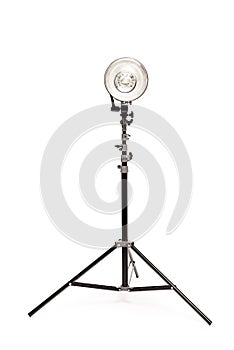 Powerful photo flash on the rack on a white background