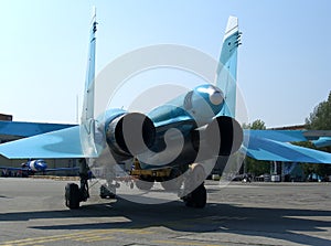 Powerful Russian military jet fighter plane on the runway of the SU-34 two jet turbine engine