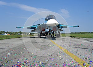 Powerful Russian military jet fighter plane on the runway of the SU-34 two jet turbine engine