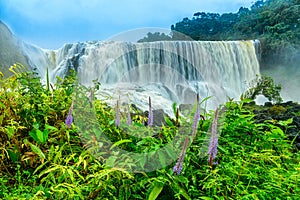 The powerful of Sae Pong Lai waterfall in Southern Laos