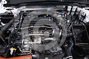 Powerful sports car engine. Internal design of vehicle engine. Car engine part. Under the hood of modern powerful car engine