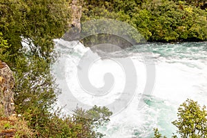 Powerful stream of water flowing down Huka Falls