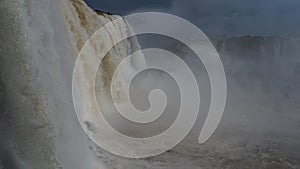 Powerful streams of the waterfall. Close-up.