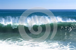Powerful wave along beach
