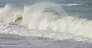 Powerful waves breaking on the beach