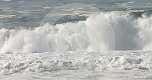 Powerful waves breaking on the beach