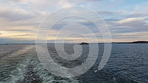 Powerful waves following the ship. Waves behind the stern of the ship. Track from the engines of the ship.