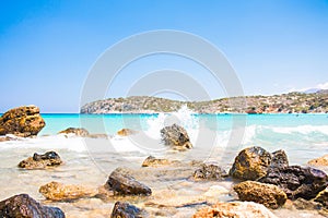 Powerful Waves on a rocky beach Voulisma, Agios Nikolaos, Istros. Greece Crete.