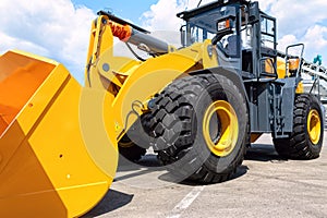 Powerful yellow new front loader