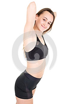 Powerful young fit woman on a white background