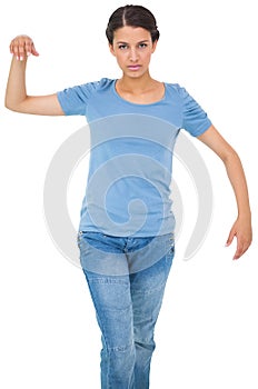 Powerless brunette in jeans and tshirt photo