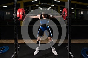 Powerlifter Doing Exercise For Legs With Barbell