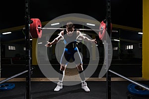 Powerlifter Doing Exercise For Legs With Barbell