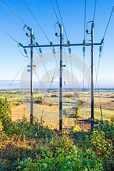 Powerline with a aerial view over the landscape at autumn