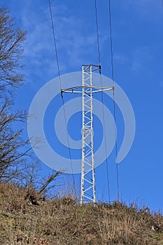 Powerline pole on the hill