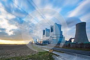 Powerplant pollution at a cloudy sunset sky