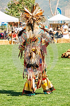 Powwow.  Native Americans dressed in full regalia.  Chumash Day Powwow and Intertribal Gathering