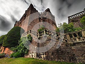 Powys Castle was originally a medieval castle, later rebuilt into a chateau, surrounded by Baroque gardens.