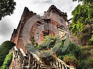 Powys Castle was originally a medieval castle, later rebuilt into a chateau, surrounded by Baroque gardens.