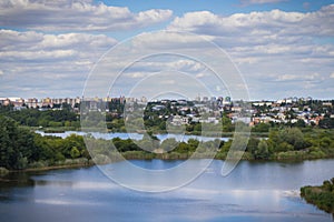 Poznan, Poland - August 08, 2022: View from observation tower Szachty on park, pond and buildings in town Poznan. Relax in