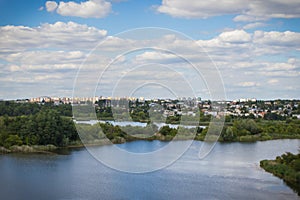 Poznan, Poland - August 08, 2022: View from observation tower Szachty on park, pond and buildings in town Poznan. Relax in