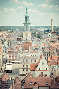 Poznan, Poland - June 28, 2016: Vintage photo, Town hall, old and modern buildings in polish city Poznan