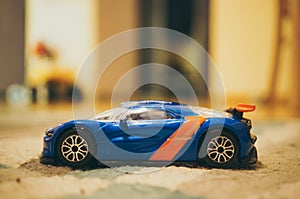 POZNAN, POLAND - Nov 13, 2016: Bburago blue toy model sport ca