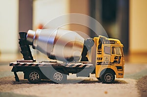 POZNAN, POLAND - Nov 13, 2016: Toy model cement truck on a floor