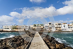 Pozo Izquierdo overlook with breakwater with a sidewalk, Gran Canaria, Spain photo