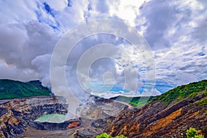 PoÃÂ¡s volcano crater with sulphur vapour clouds