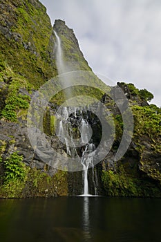 PoÃÂ§o do Bacalhau waterfall, Flores island, Azores, Portugal photo