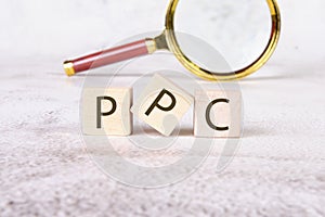 ppc letters on wooden cubes, business as usual concept image