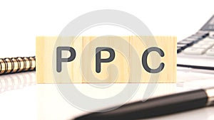 PPC - Pay Per Click concept Business on wooden cubes on a white background