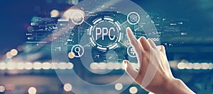 PPC - Pay per click concept with hand pressing a button