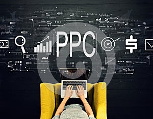 PPC - Pay per click concept with person using a laptop