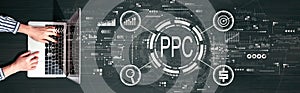 PPC - Pay per click concept with person using a laptop