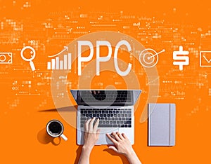 PPC - Pay per click concept with person using a laptop