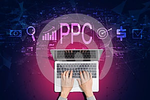 PPC - Pay per click concept with person using laptop