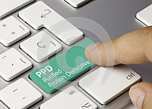 PPD Purified Protein Derivative - Inscription on Green Keyboard Key photo