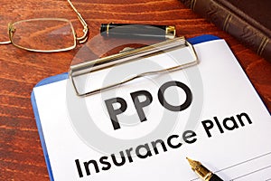 PPO Insurance Plan on a table.