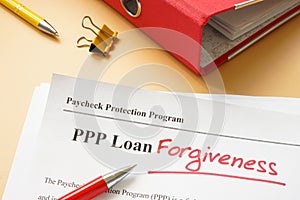 PPP loan forgiveness handwritten word on the application.