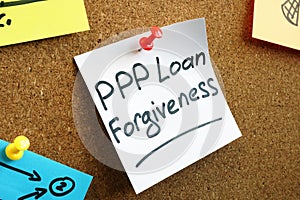 PPP loan forgiveness memo on the board.