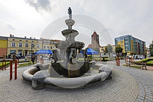 Prabuty, pomorskie / Poland - September, 25, 2020: A fountain and a market square in a small town. Town center in Central Europe